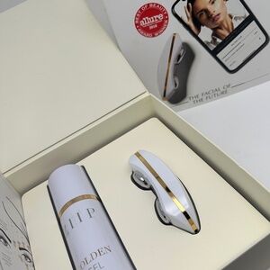 ZIIP White and Gold Facial Device